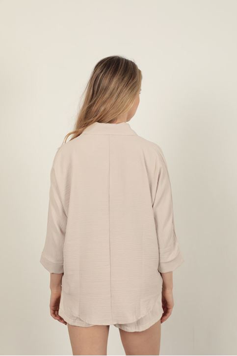 قميص نسائي بفتحة رقبة على شكل حرف V - حجري