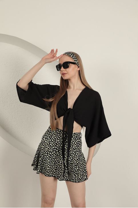 تنورة قصيرة بنقشة ديزي - سوداء